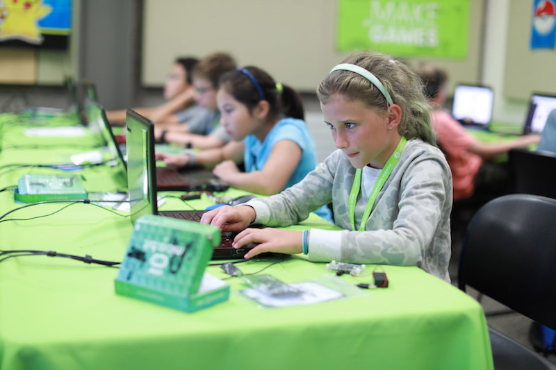 Kids working on code